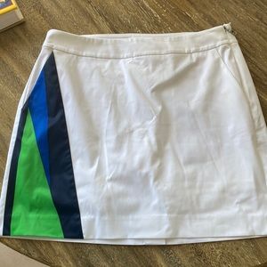 Raph Lauren golf skirt, size 6. Green & blue detail on one side. Never been worn